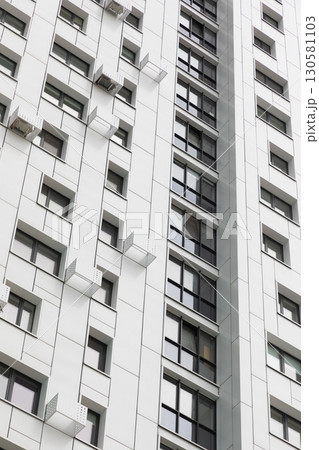 Modern high-rise apartment buildings in an urban residential area emphasizing rent and mortgage Modern high-rise apartment buildings in an urban residential area emphasizing rent and mortgage 130581103