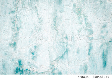 Macro fragment of an old surface with cracked paint structure. Texture of a metal sheet painted white and blue. Multilayered, worn surface. Macro fragment of an old surface with cracked paint structure. Texture of a metal sheet painted white and blue. Multilayered, worn surface. 130581245