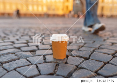 Paper cup of drink on square in St. Petersburg 130581715