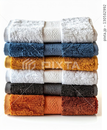 Stack of Colorful Soft Bath Towels on White Background 130582992