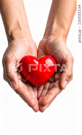 Hands Holding a Red Heart on White Background 130583334