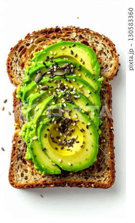 Sliced Avocado Toast with Seeds on Whole Wheat Bread Sliced Avocado Toast with Seeds on Whole Wheat Bread 130583360