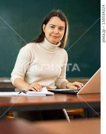 Portrait of a girl student preparing for classes 130584224