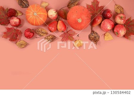 Autumn composition with seasonal leaves, pumpkins, apples on a pastel background, Minimal Happy Thanksgiving concept, postcard, selective focus., Flat lay, place for text Autumn composition with seasonal leaves, pumpkins, apples on a pastel background, Minimal Happy Thanksgiving concept, postcard, selective focus., Flat lay, place for text 130584402