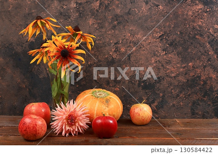 Autumn background with apples, pears, pumpkins, sunflower flowers on wooden table, Thanksgiving concept, rustic harvest, healthy natural food concept, screen banner, cafe, restaurant, selective focus Autumn background with apples, pears, pumpkins, sunflower flowers on wooden table, Thanksgiving concept, rustic harvest, healthy natural food concept, screen banner, cafe, restaurant, selective focus 130584422