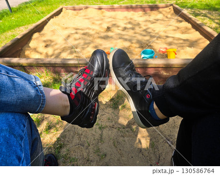 Couple Wearing Sneakers Walking Together, Urban Lifestyle Couple Wearing Sneakers Walking Together, Urban Lifestyle 130586764