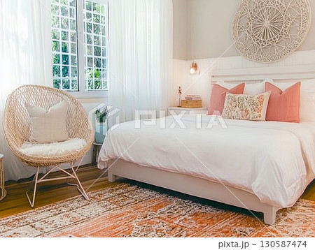 Cozy modern bedroom with soft colors, stylish decor, and natural light  130587474