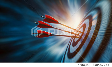 Red arrows hitting a target with motion blur, symbolizing focus and achievement in goals 130587733