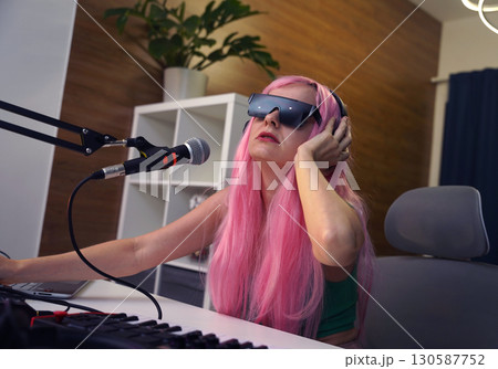 Beautiful young singer and musician broadcast from her home studio Beautiful young singer and musician broadcast from her home studio 130587752