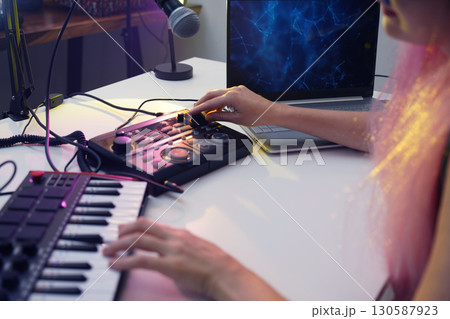 Beautiful young singer and musician broadcast from her home studio Beautiful young singer and musician broadcast from her home studio 130587923