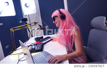 Beautiful young singer and musician broadcast from her home studio Beautiful young singer and musician broadcast from her home studio 130587927