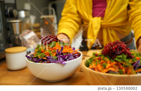 Young woman is broadcasting live from workshop how to prepare a vegetarian food 130588002
