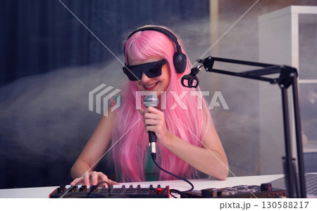 Beautiful young singer and musician broadcast from her home studio 130588217