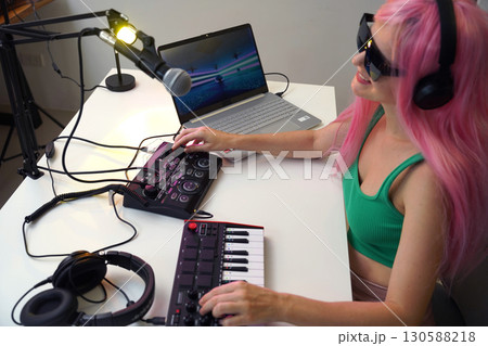 Beautiful young singer and musician broadcast from her home studio 130588218