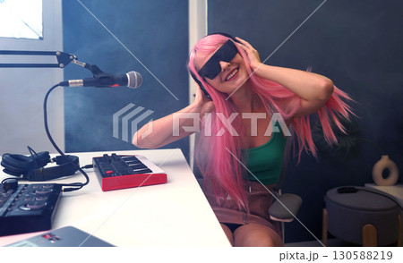 Beautiful young singer and musician broadcast from her home studio 130588219