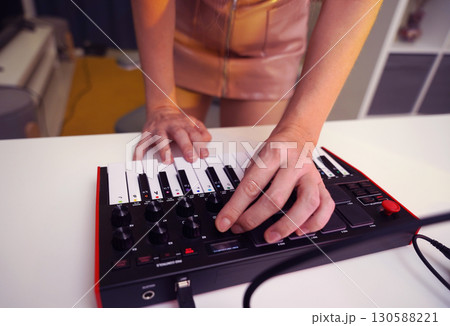 Beautiful young singer and musician broadcast from her home studio Beautiful young singer and musician broadcast from her home studio 130588221
