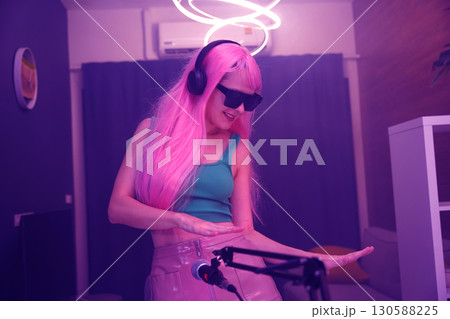 Beautiful young singer and musician broadcast from her home studio Beautiful young singer and musician broadcast from her home studio 130588225