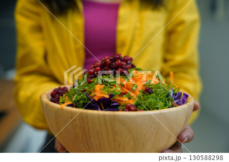 Young woman is broadcasting live from workshop how to prepare a vegetarian food Young woman is broadcasting live from workshop how to prepare a vegetarian food 130588298