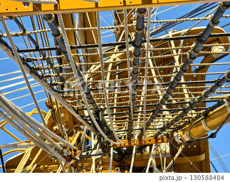 Ropes stretched across the masts of an old ship 130588484
