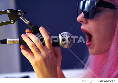 Beautiful young singer and musician broadcast from her home studio 130588547