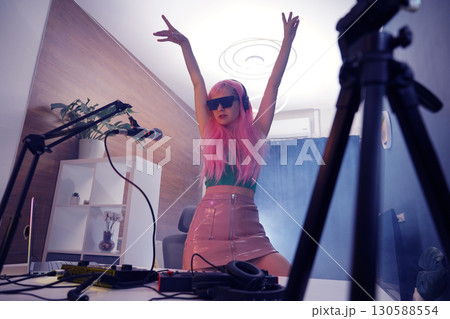 Beautiful young singer and musician broadcast from her home studio 130588554