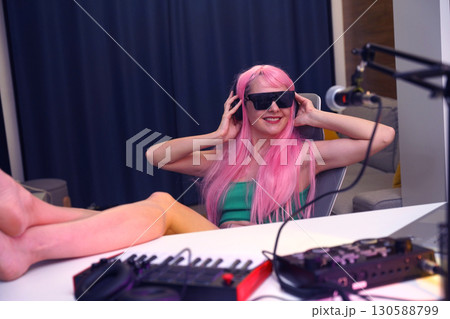 Beautiful young singer and musician broadcast from her home studio 130588799