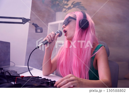 Beautiful young singer and musician broadcast from her home studio 130588802
