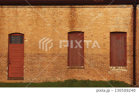 Close up Of Doors on Abandoned Historic Building 130589240