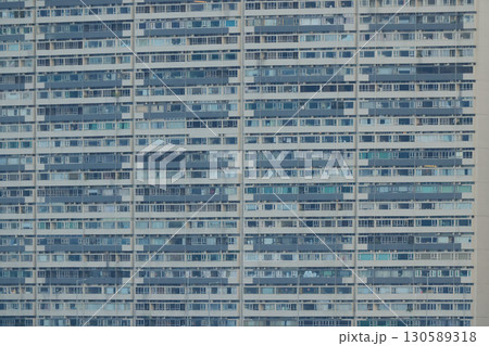 Sept 6 2025 High-Rise Apartment Building With Rows of Windows and Balconies Sept 6 2025 High-Rise Apartment Building With Rows of Windows and Balconies 130589318