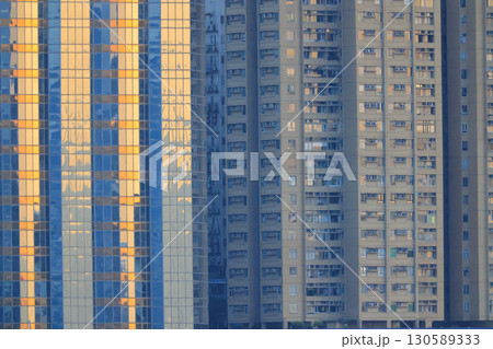 Sept 6 2025 High-Rise Apartment Building With Rows of Windows and Balconies 130589333