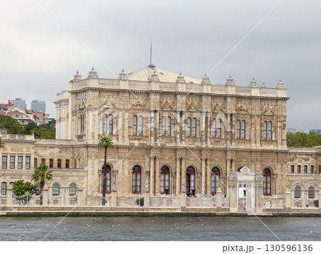 Dolmabahce Palace view from the Bosphorus in Istanbul. Ottoman architecture, cultural heritage and historical tourism in Turkey. Dolmabahce Palace view from the Bosphorus in Istanbul. Ottoman architecture, cultural heritage and historical tourism in Turkey. 130596136