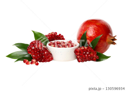 Red seeds and green leaves of pomegranates, isolated, PNG Red seeds and green leaves of pomegranates, isolated, PNG 130596934