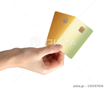 Closeup of hand gripping chip card. Debit, salary, cashback, credit service, secure finance, revenue Closeup of hand gripping chip card. Debit, salary, cashback, credit service, secure finance, revenue 130597936
