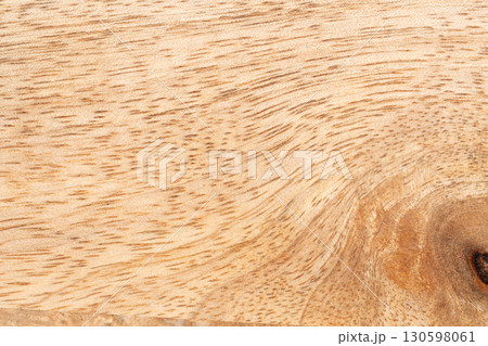 Mango wood texture top view. Kitchen wooden tray background, organic Mangifera indica veneer Mango wood texture top view. Kitchen wooden tray background, organic Mangifera indica veneer 130598061