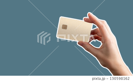 Hand holding chip enabled card conveys smooth payment process, income flow, and secure credit usage 130598162