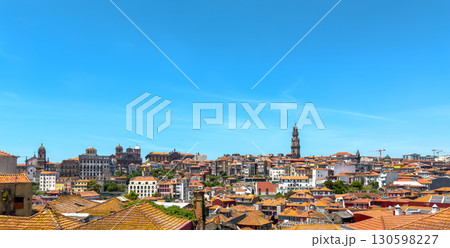 Porto panoramic cityscape with Clerigos tower and cathedral spire, red tiled rooftops, historic old Porto panoramic cityscape with Clerigos tower and cathedral spire, red tiled rooftops, historic old 130598227