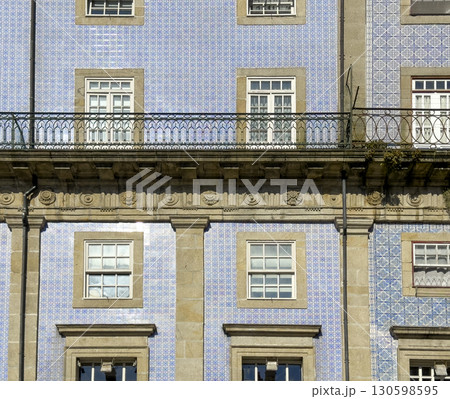 traditional Portuguese building facade decorated with blue azulejo ceramic tiles in Porto. The 130598595