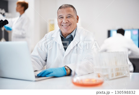 Happy, research and portrait of a scientist with a laptop for healthcare, virus results and email. Lab, science and mature man typing on a computer for medical innnovation, analysis and report Happy, research and portrait of a scientist with a laptop for healthcare, virus results and email. Lab, science and mature man typing on a computer for medical innnovation, analysis and report 130598832