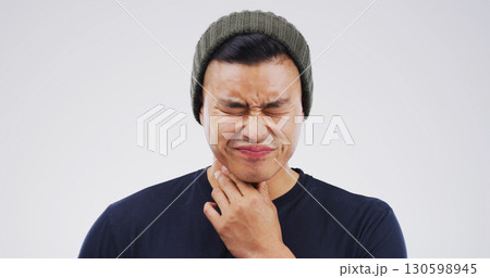 Allergy, hurt and man with sore throat on studio space for cold, flu or virus symptoms. Asthma, bacteria or Asian person isolated on white background with neck pain, thyroid inflammation or injury Allergy, hurt and man with sore throat on studio space for cold, flu or virus symptoms. Asthma, bacteria or Asian person isolated on white background with neck pain, thyroid inflammation or injury 130598945