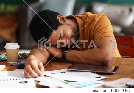 Tired, exhausted and man sleeping in the office while working on a creative advertising project. Burnout, company and professional African male employee taking nap while planning report in workplace. Tired, exhausted and man sleeping in the office while working on a creative advertising project. Burnout, company and professional African male employee taking nap while planning report in workplace. 130599367