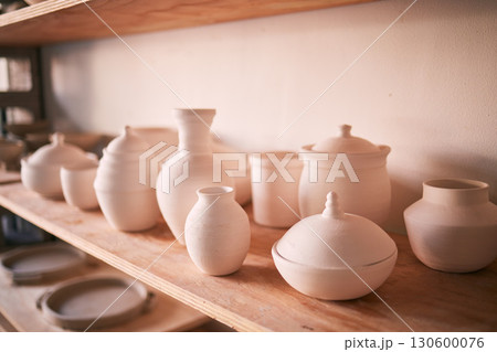 Pottery background, ceramics and shelf in workshop, creative store or manufacturing startup. Clay products, collection and display in studio, small business and retail craft shop of stock production Pottery background, ceramics and shelf in workshop, creative store or manufacturing startup. Clay products, collection and display in studio, small business and retail craft shop of stock production 130600076