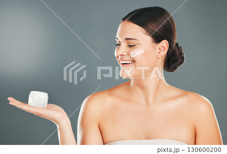 Woman apply cream for face, happy with smile and beauty, skincare and moisturizer isolated on studio background. Sunscreen, lotion and healthy skin with glow, wellness and facial treatment product Woman apply cream for face, happy with smile and beauty, skincare and moisturizer isolated on studio background. Sunscreen, lotion and healthy skin with glow, wellness and facial treatment product 130600200
