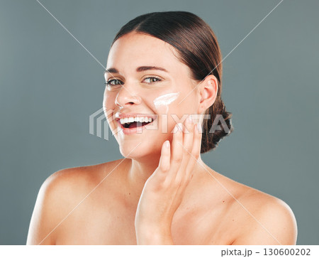 Skincare cream, beauty portrait and woman face with happiness from sunscreen and self care. Wellness, spa and smile of model with collagen lotion with studio background and dermatology treatment Skincare cream, beauty portrait and woman face with happiness from sunscreen and self care. Wellness, spa and smile of model with collagen lotion with studio background and dermatology treatment 130600202