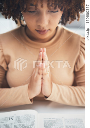 Black woman praying hands with book for religion, faith and god help, holy support and spiritual healing. Prayer hands, hope and christian person with bible education for hope, trust and worship Black woman praying hands with book for religion, faith and god help, holy support and spiritual healing. Prayer hands, hope and christian person with bible education for hope, trust and worship 130600337