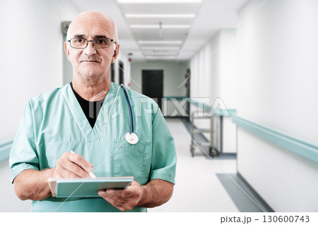 Professional Doctor in Medical Uniform in Hospital Interior Professional Doctor in Medical Uniform in Hospital Interior 130600743