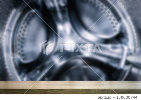 Product Display Table with Washing Machine Drum Background Product Display Table with Washing Machine Drum Background 130600744