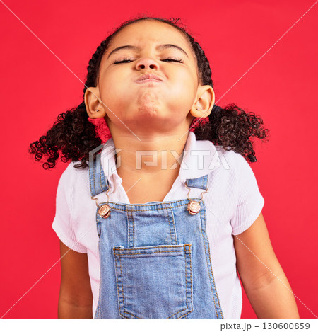 Attitude, childhood and face of girl on red background in studio with angry, upset and frustrated reaction. Emoji, comic and young kid with air in cheeks, tantrum behaviour and mad facial expression Attitude, childhood and face of girl on red background in studio with angry, upset and frustrated reaction. Emoji, comic and young kid with air in cheeks, tantrum behaviour and mad facial expression 130600859