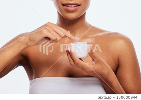 Cream, jar and woman skincare for face, body and cosmetics in studio, isolated and white background. Facial lotion, beauty product and model with container for healthy glow, shine or aesthetic makeup 130600944