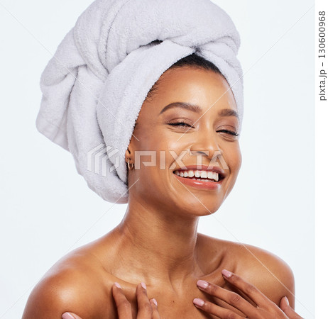 Hair care, towel and woman face portrait in studio, isolated white background and facial beauty. Female model, clean shower and head cloth for happy skincare, laughing and smile for body dermatology Hair care, towel and woman face portrait in studio, isolated white background and facial beauty. Female model, clean shower and head cloth for happy skincare, laughing and smile for body dermatology 130600968