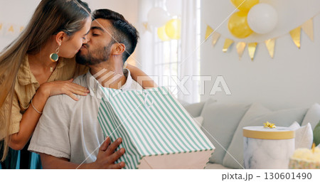 Birthday, kiss and couple with gift, cake and celebration, love and having fun while bonding at home. Event, present and woman with man in a living room care, support or congratulations gesture Birthday, kiss and couple with gift, cake and celebration, love and having fun while bonding at home. Event, present and woman with man in a living room care, support or congratulations gesture 130601490